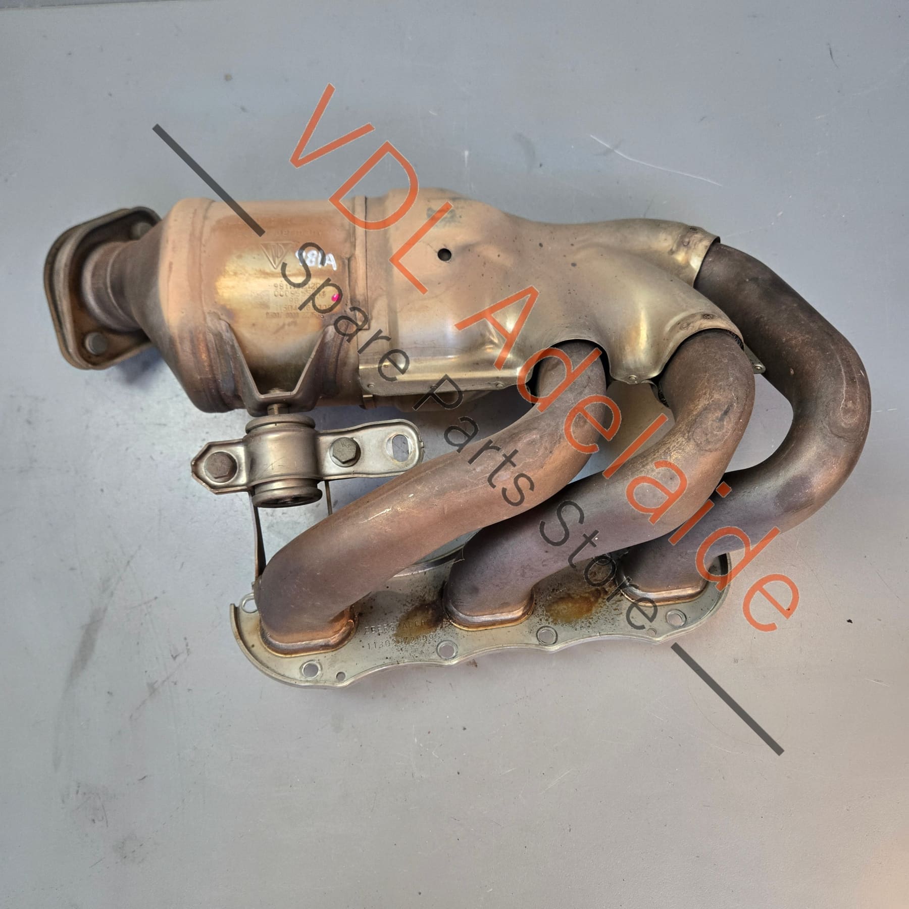 98111321205 981113212EX   Porsche Boxster Cayman 2.7L Right Exhaust Manifold w Catalytic Converter 98111321205 981113212EX