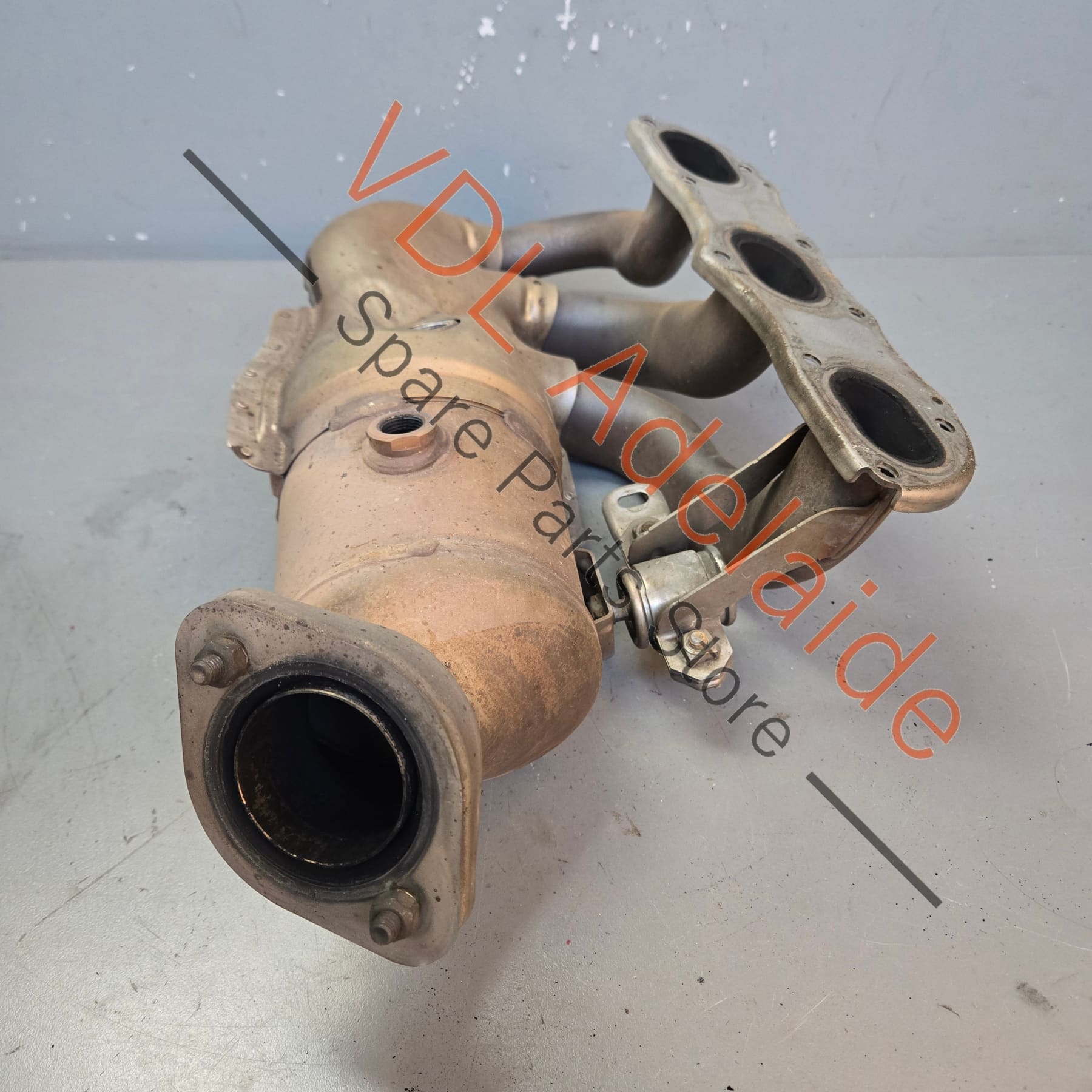 98111321105 981113211EX   Porsche Boxster Cayman 2.7L Left Exhaust Manifold w Catalytic Converter 98111321105 981113211EX