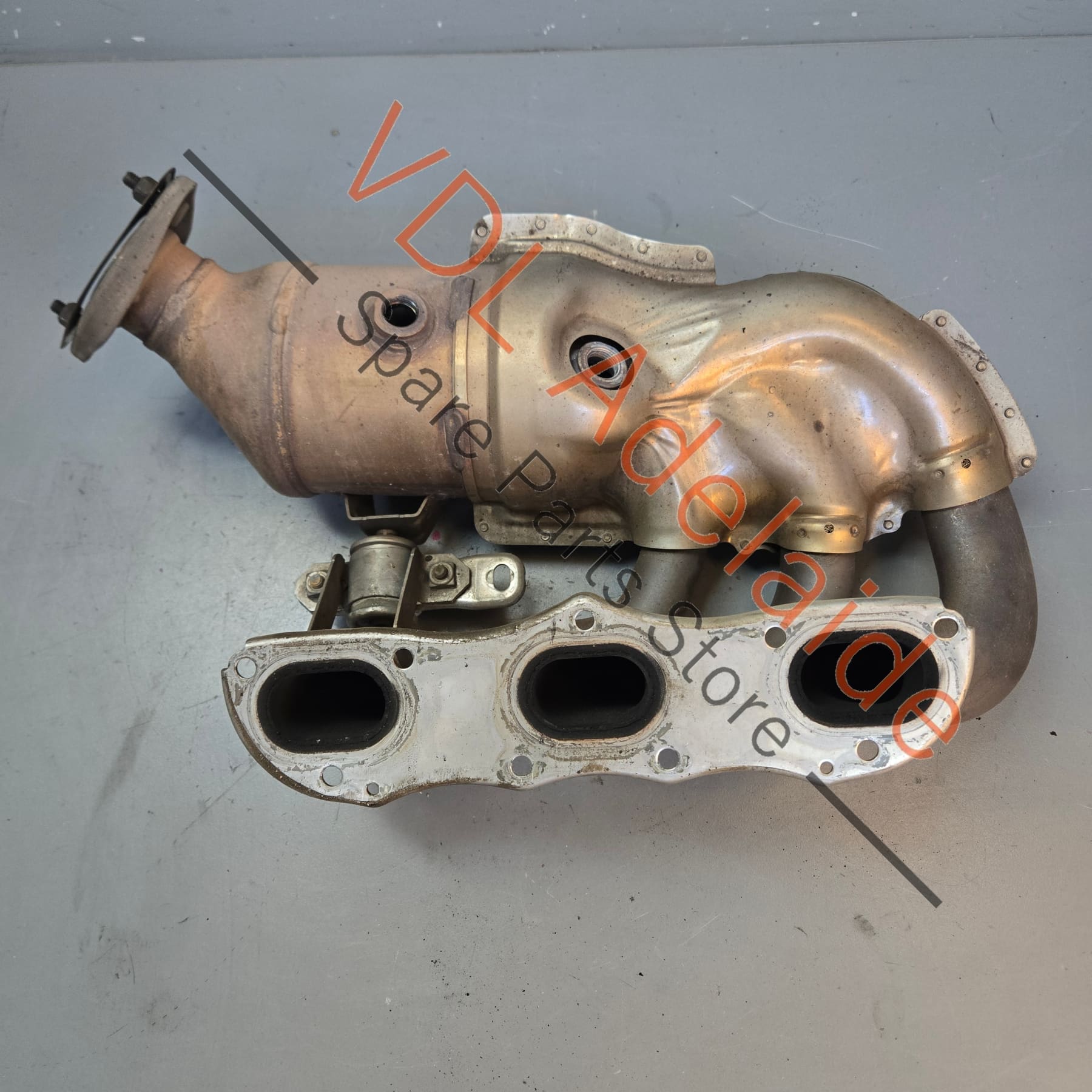 98111321105 981113211EX   Porsche Boxster Cayman 2.7L Left Exhaust Manifold w Catalytic Converter 98111321105 981113211EX