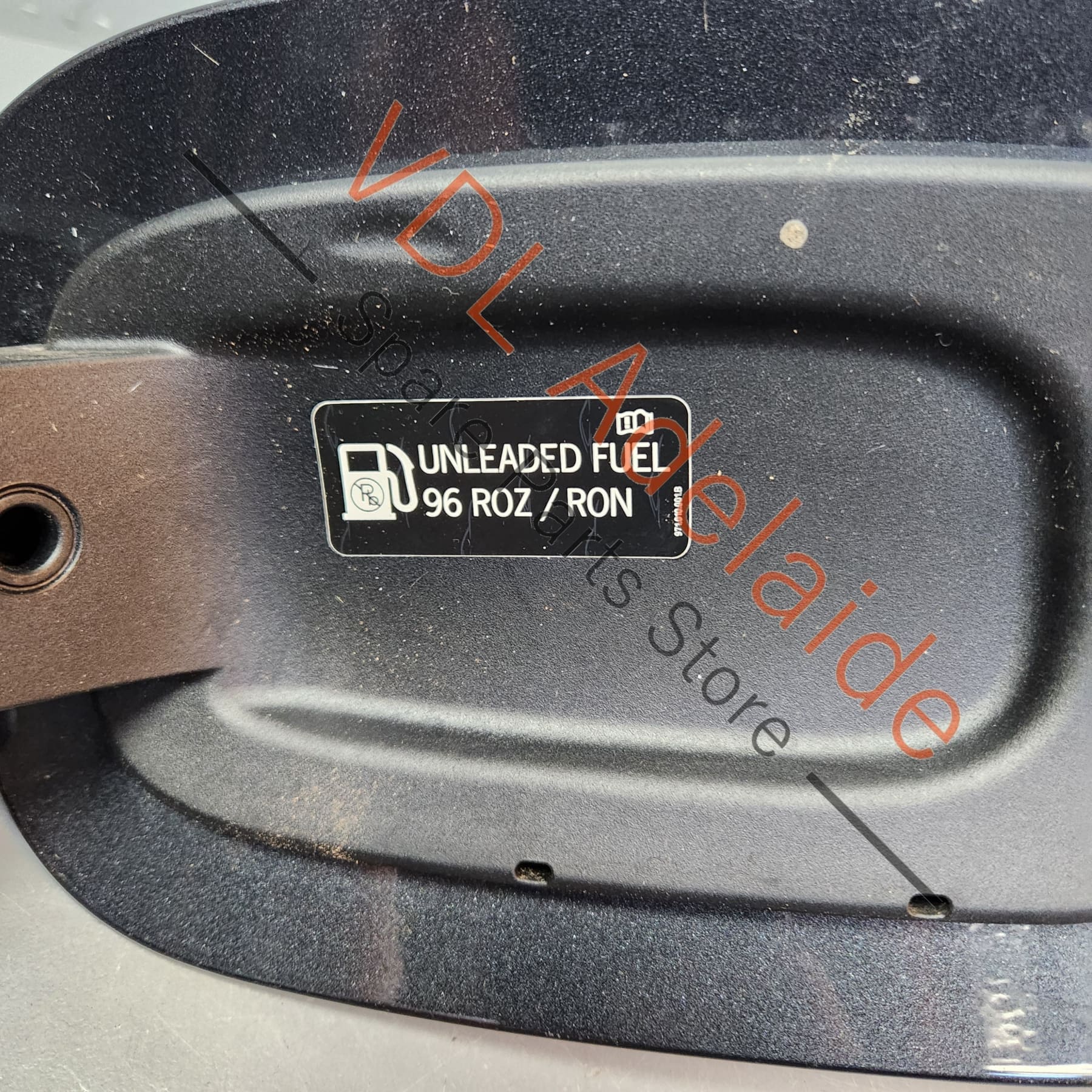 Porsche Panamera 971 Fuel Filler Flap Door with Lock Actuator 974809857 974809857      One of four retaining clips broken