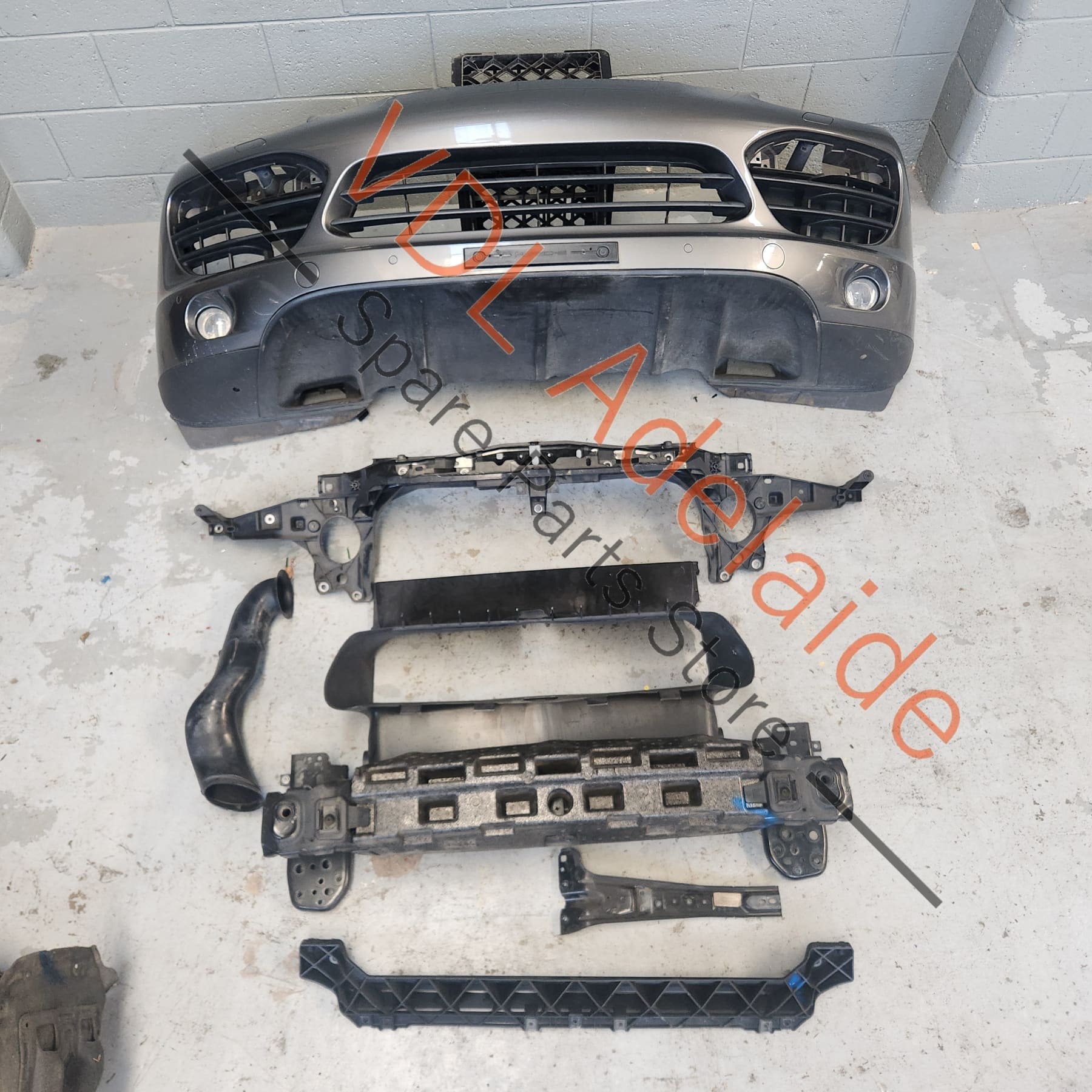 9Y0 043 061 50    Porsche Cayenne 958 Front Bumper w Grilles & Reo Bar Assembly with Headlight Washers 2010-2014 Meteor Gray Metallic M7W/9Q