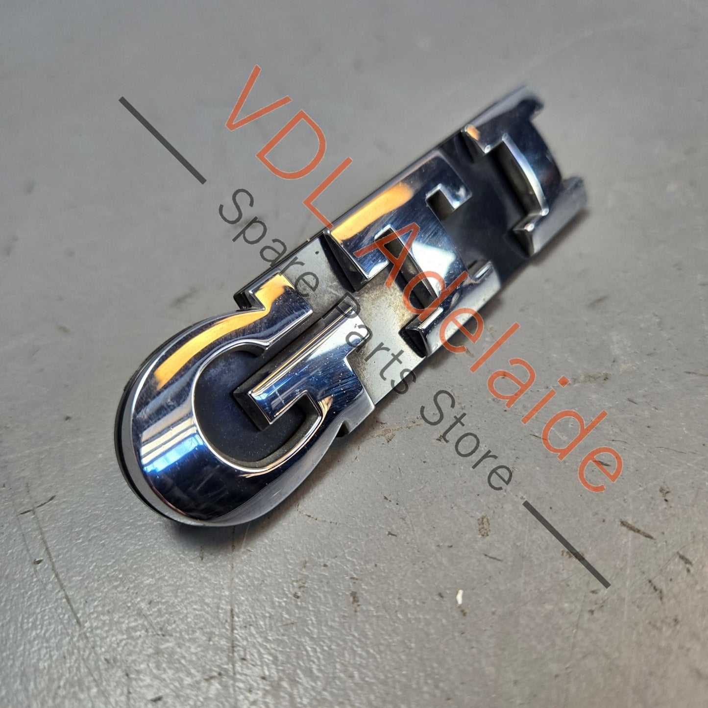 1K6853679D 1K6853679DFXC   VW Polo MK5 6R Gti Front Grille Badge 1K6853679D Chrome