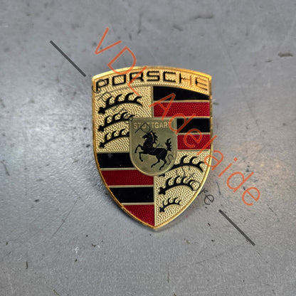 9P1853601    Porsche Bonnet Badge Emblem Gold 9P1853601 Cayenne 911 Boxster Macan