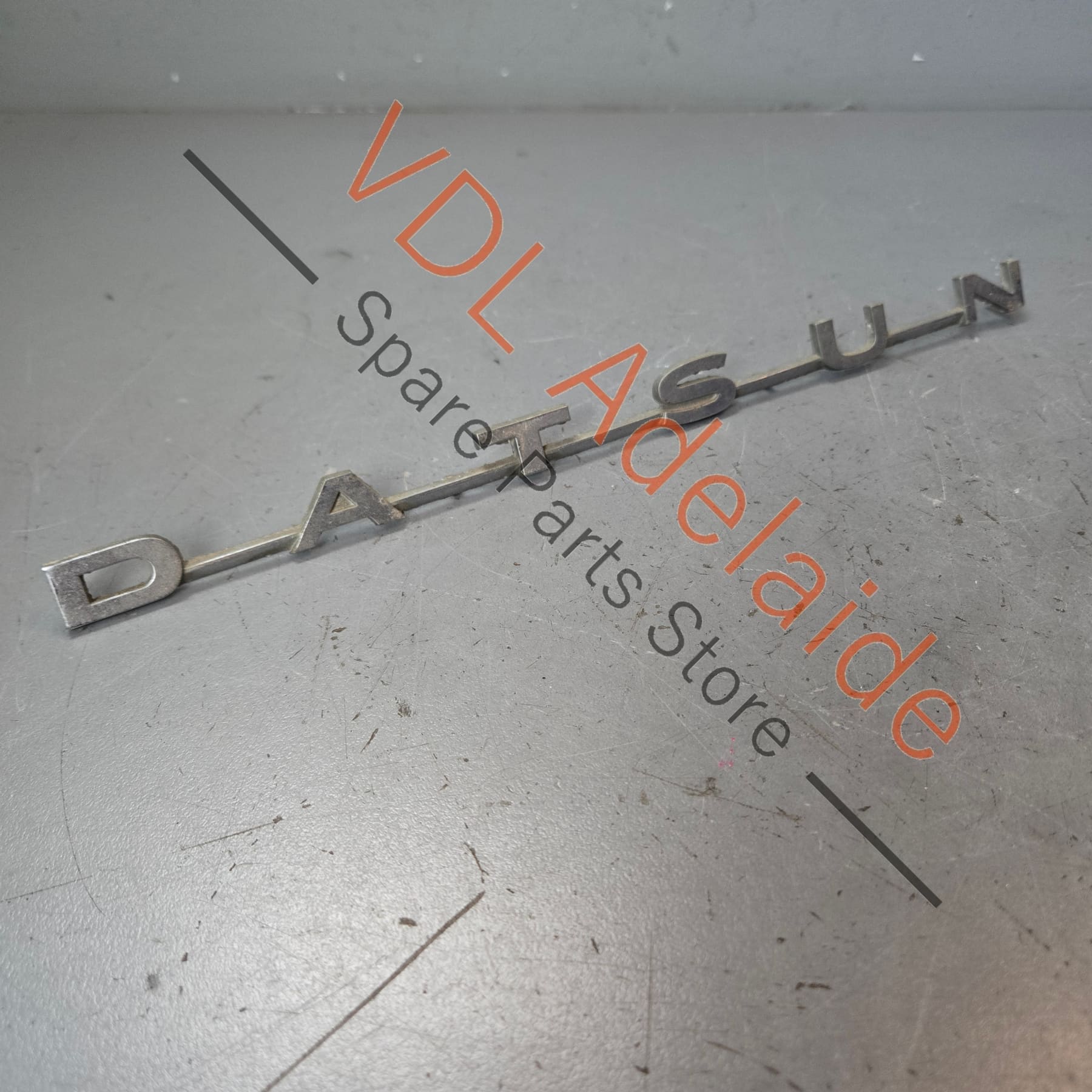 Datsun 1600 510 Rear Panel Boot Badge Emblem Genuine Cast Chrome #01