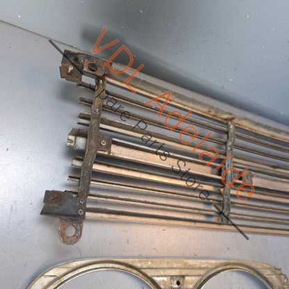 Datsun 1600 510 1968 Front Grille & Headlight Trims Complete with Centre Badge