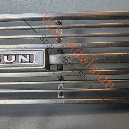 Datsun 1600 510 1968 Front Grille & Headlight Trims Complete with Centre Badge