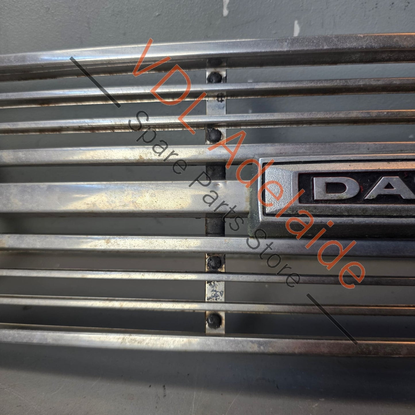 Datsun 1600 510 1968 Front Grille & Headlight Trims Complete with Centre Badge