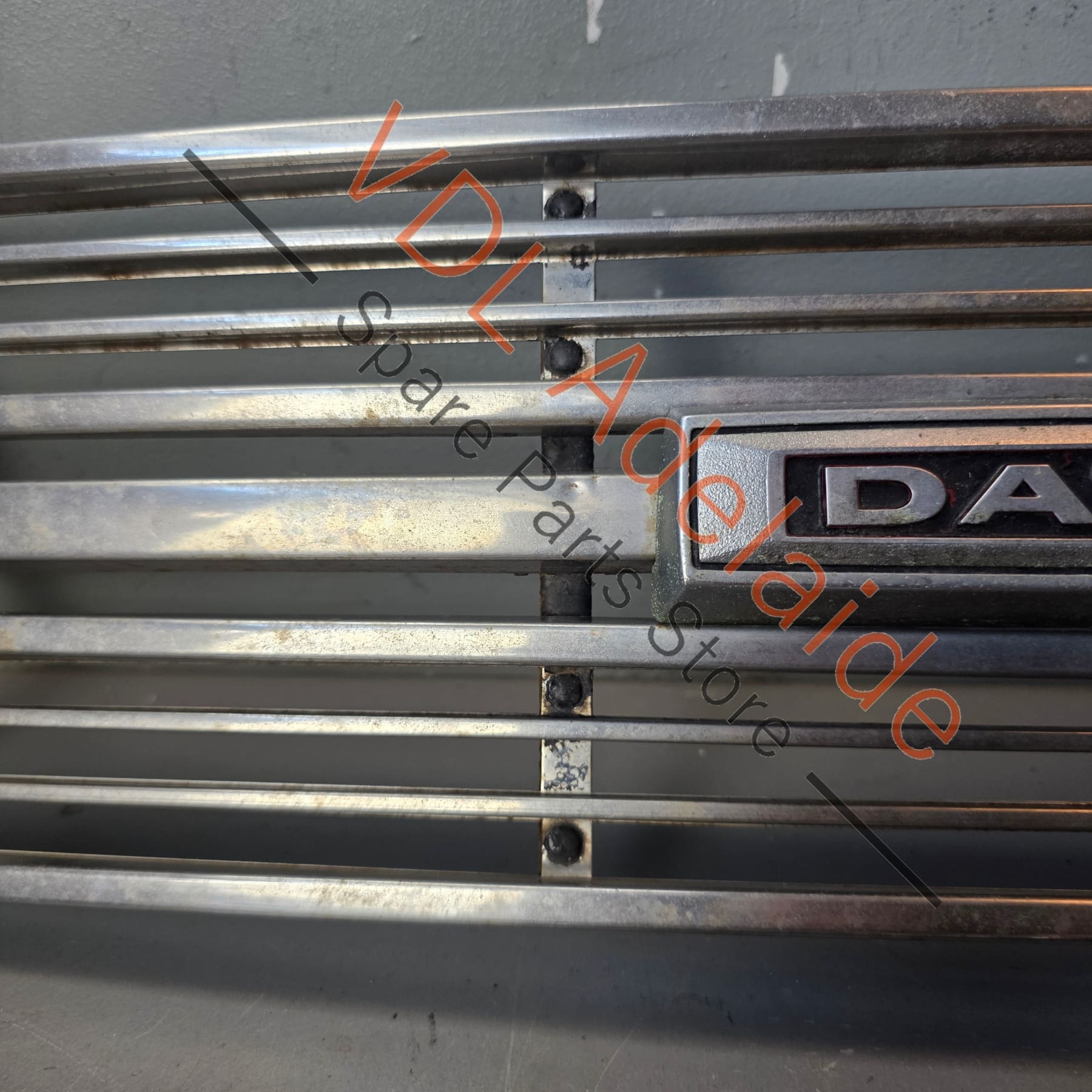Datsun 1600 510 1968 Front Grille & Headlight Trims Complete with Centre Badge