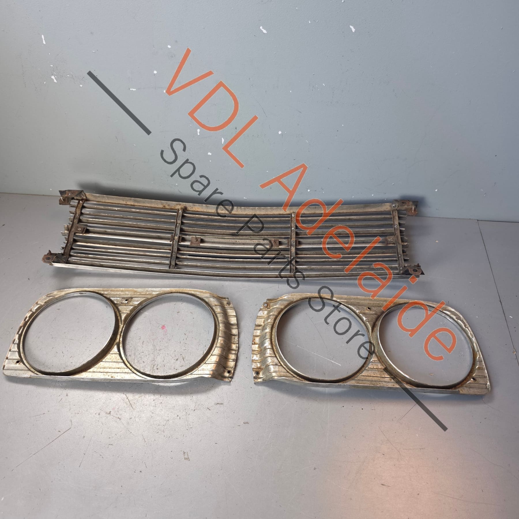 Datsun 1600 510 1968 Front Grille & Headlight Trims Complete with Centre Badge