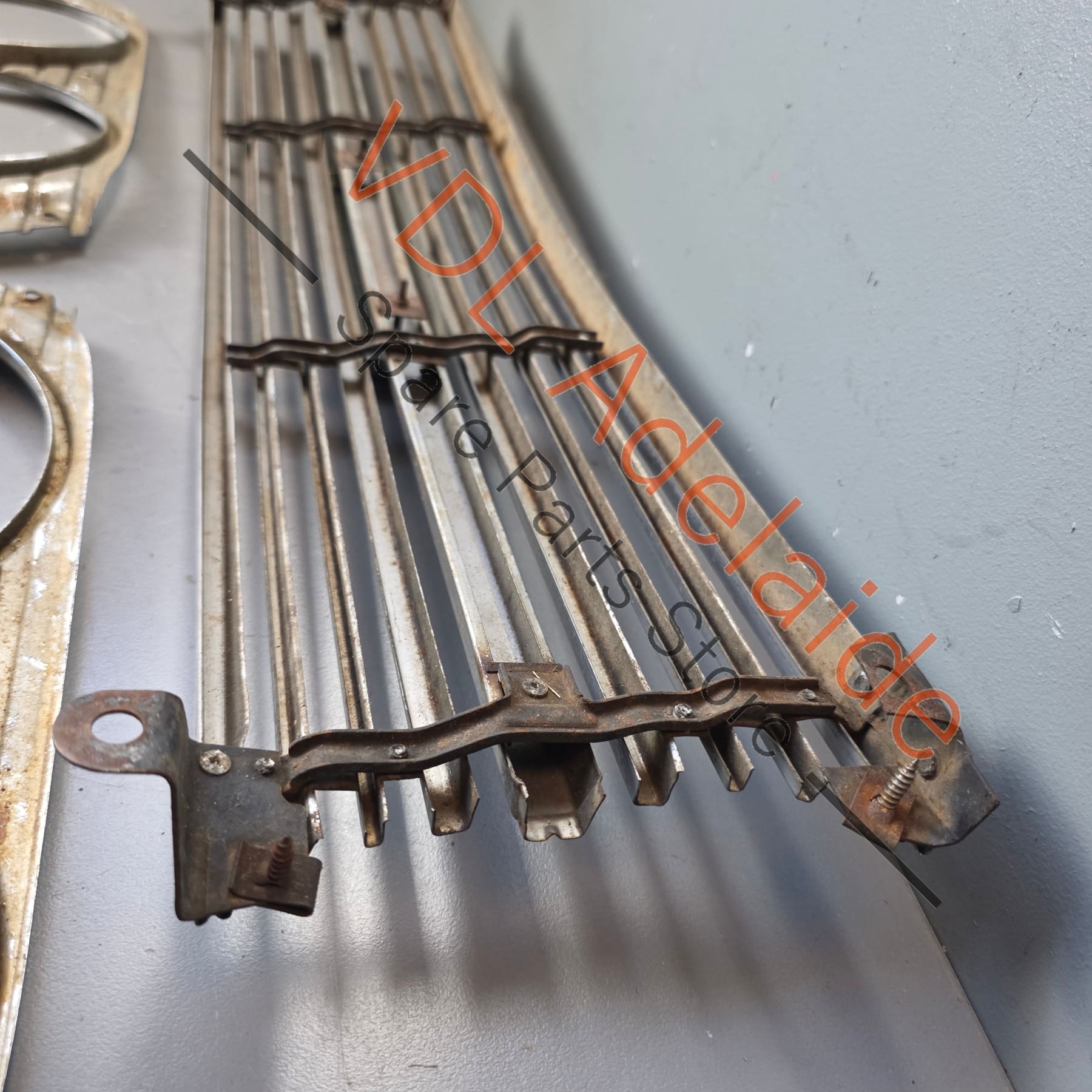 Datsun 1600 510 1968 Front Grille & Headlight Trims Complete with Centre Badge