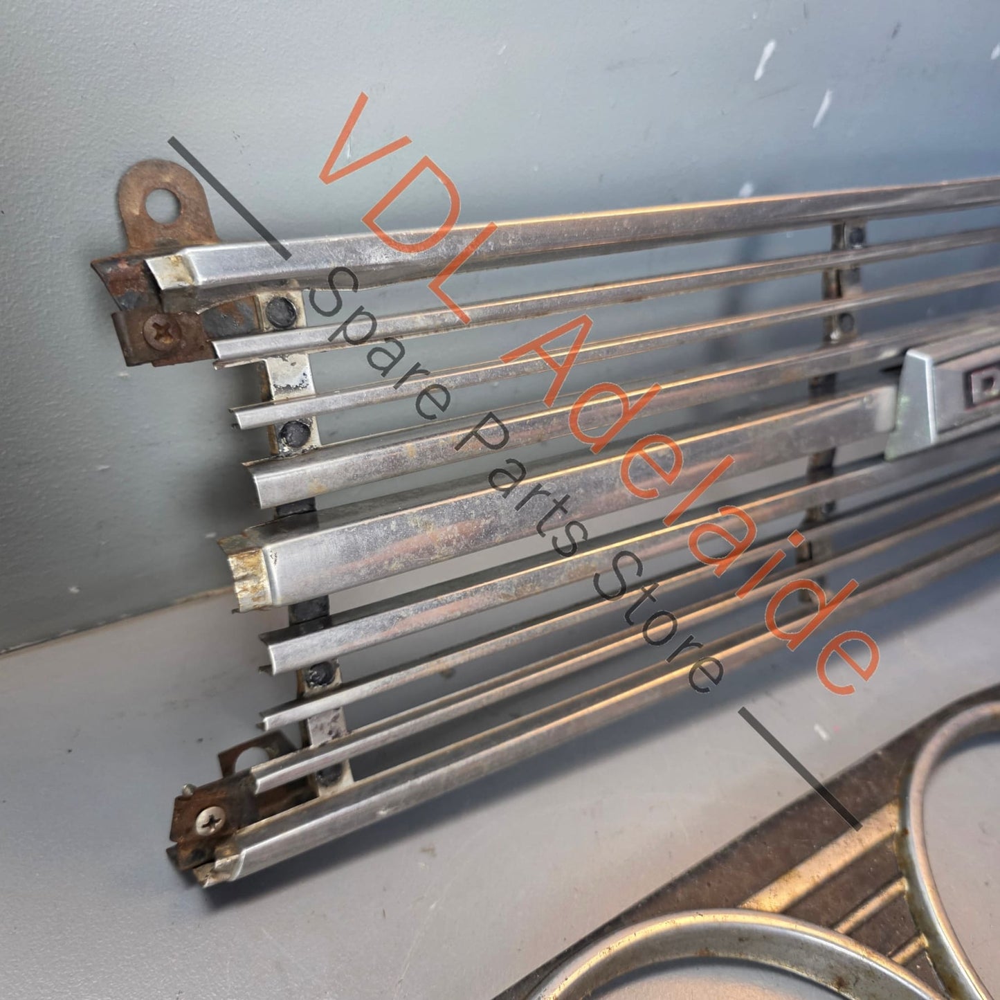 Datsun 1600 510 1968 Front Grille & Headlight Trims Complete with Centre Badge