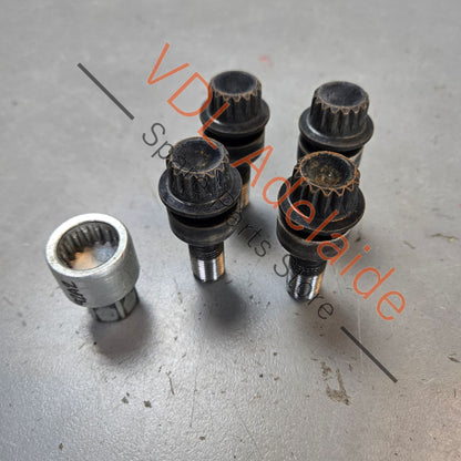 971698030B    Genuine Anti Theft Porsche Cayenne 958 Set of Wheel Lock Nuts with Key Black 971698030B