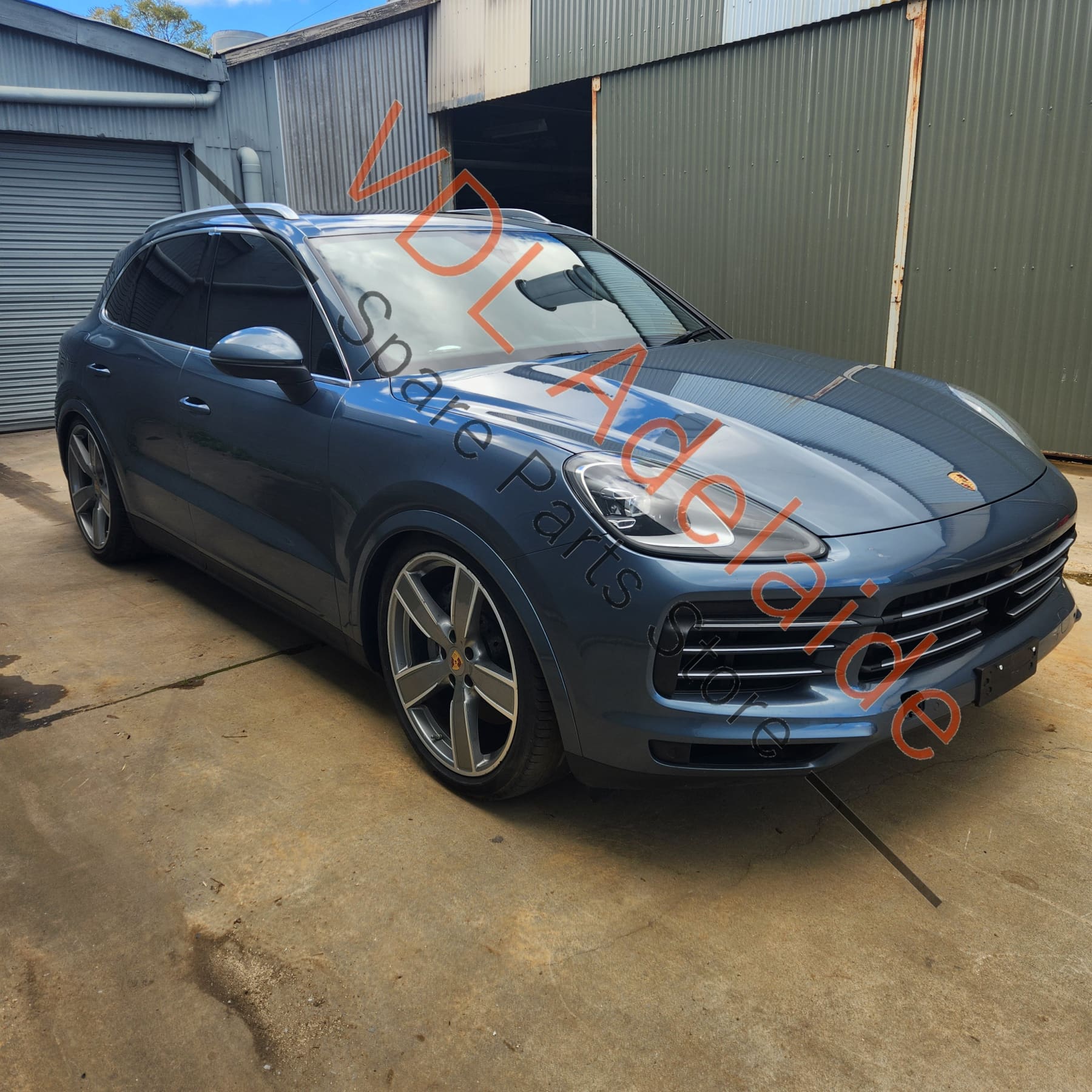 9Y0827129A    Porsche Cayenne E3 Exterior Trim for Rear Boot Tailgate with Badge & Licence Plate Light Biscay Blue